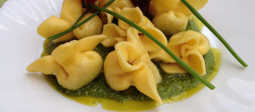 Ciuffetti (pasta purses) with arugula and speck