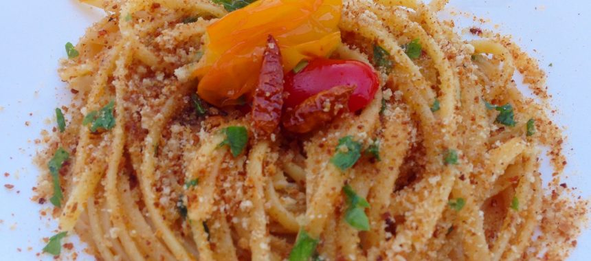 Spaghetti with garlic, olive oil, red pepper au gratin